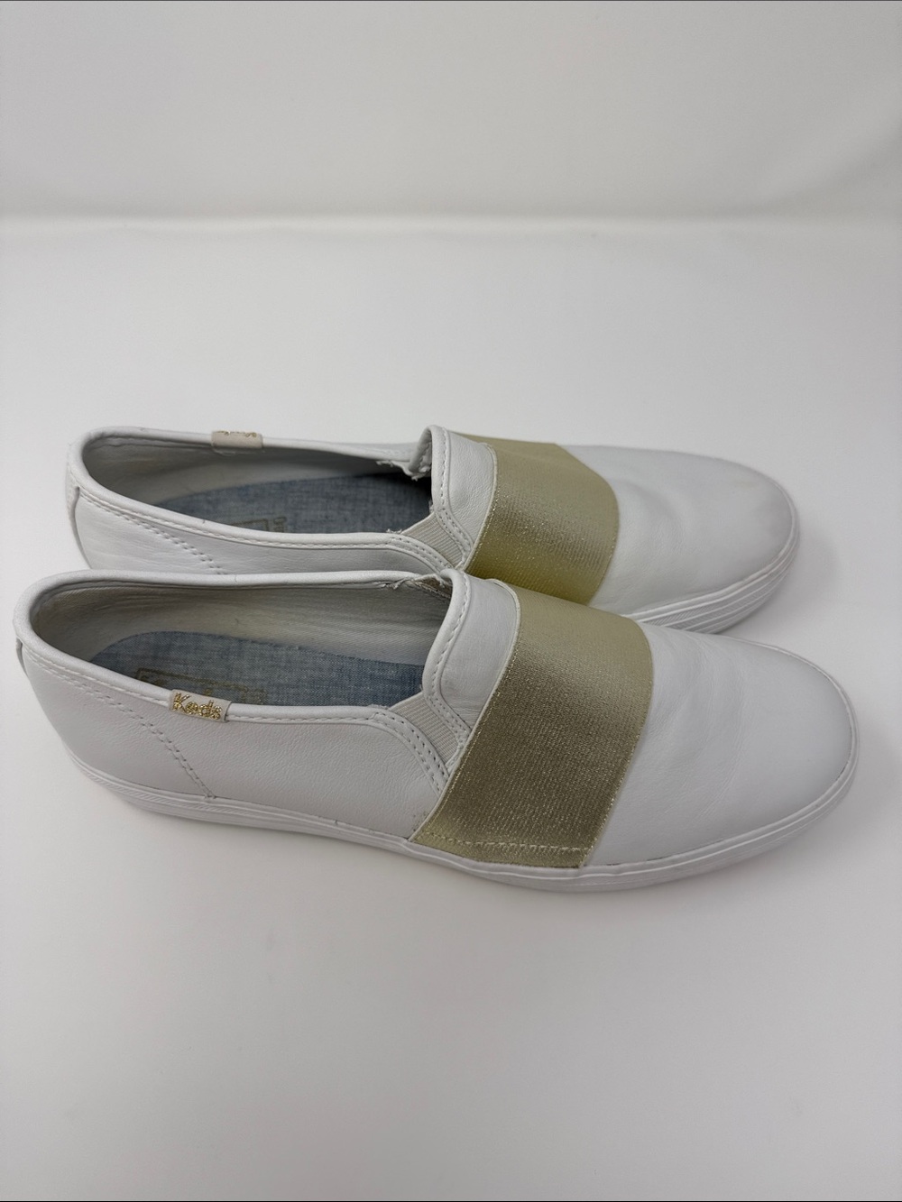 Keds White Leather Slip-Ons with Gold Elastic Strap